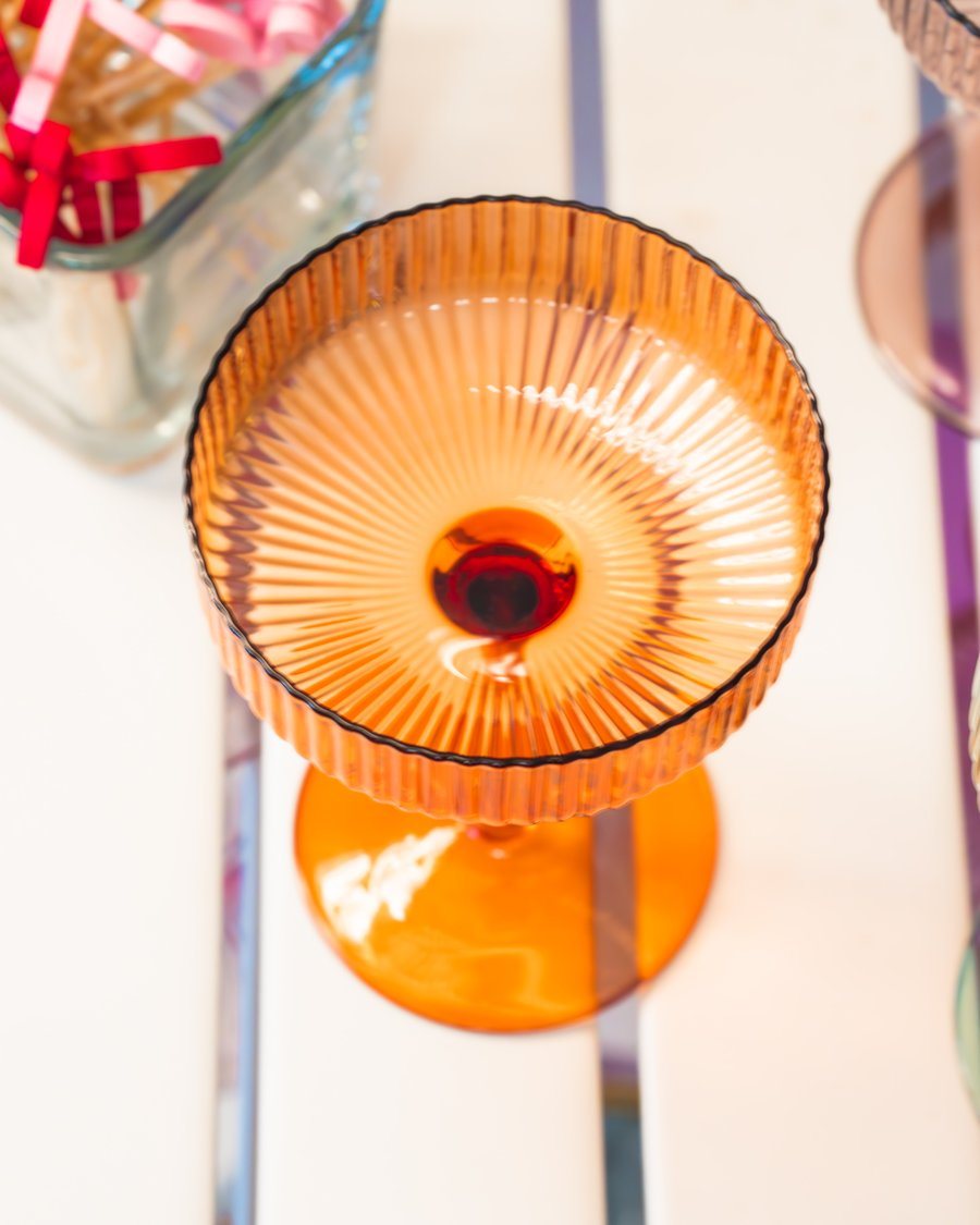 Colorful ribbed coupe glasses from above