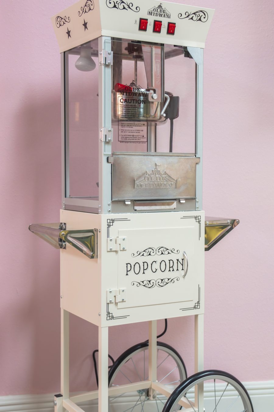 Vintage popcorn cart in the movie room