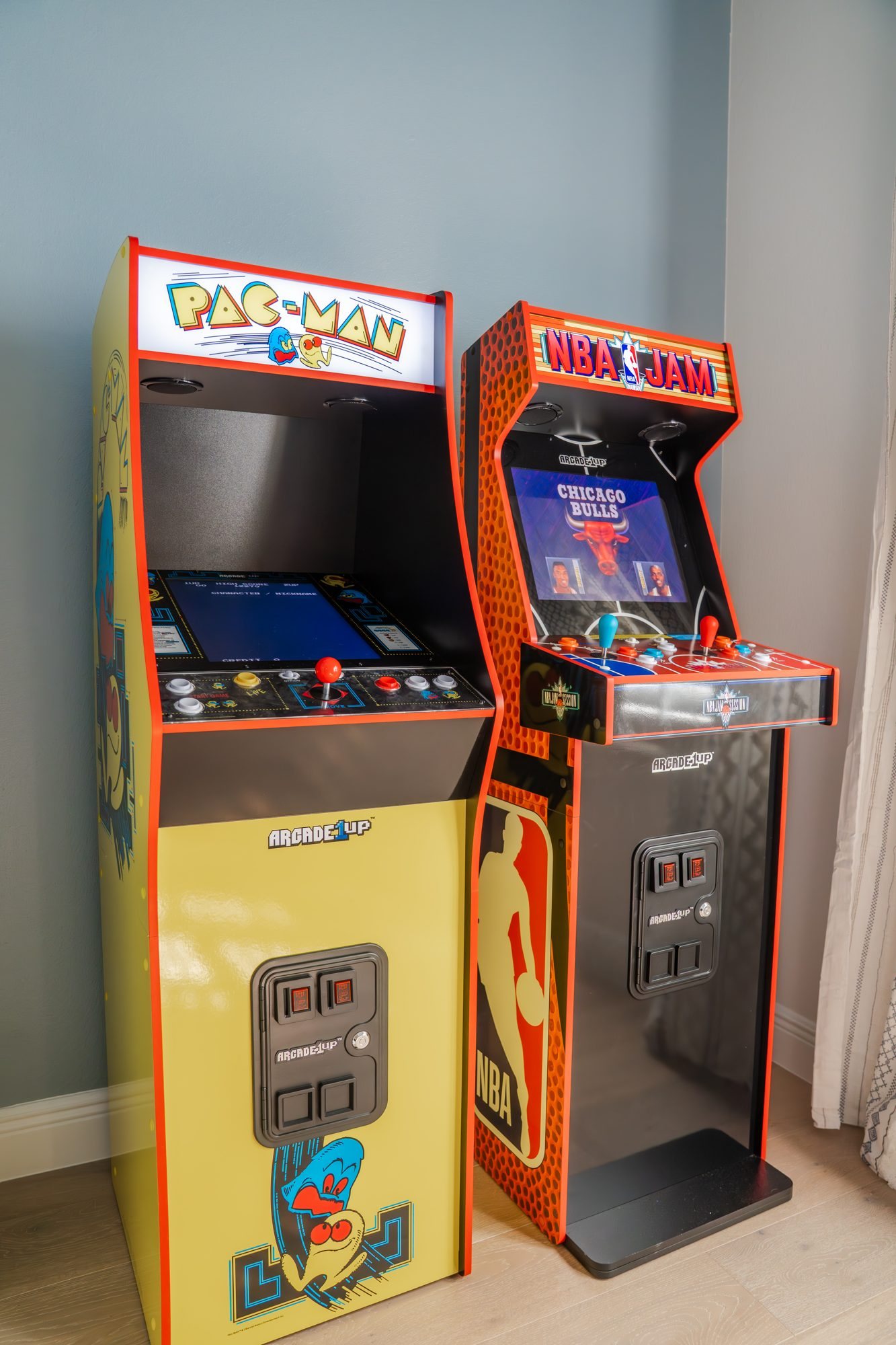 Close-up of the PAC-MAN and NBA Jam arcade games