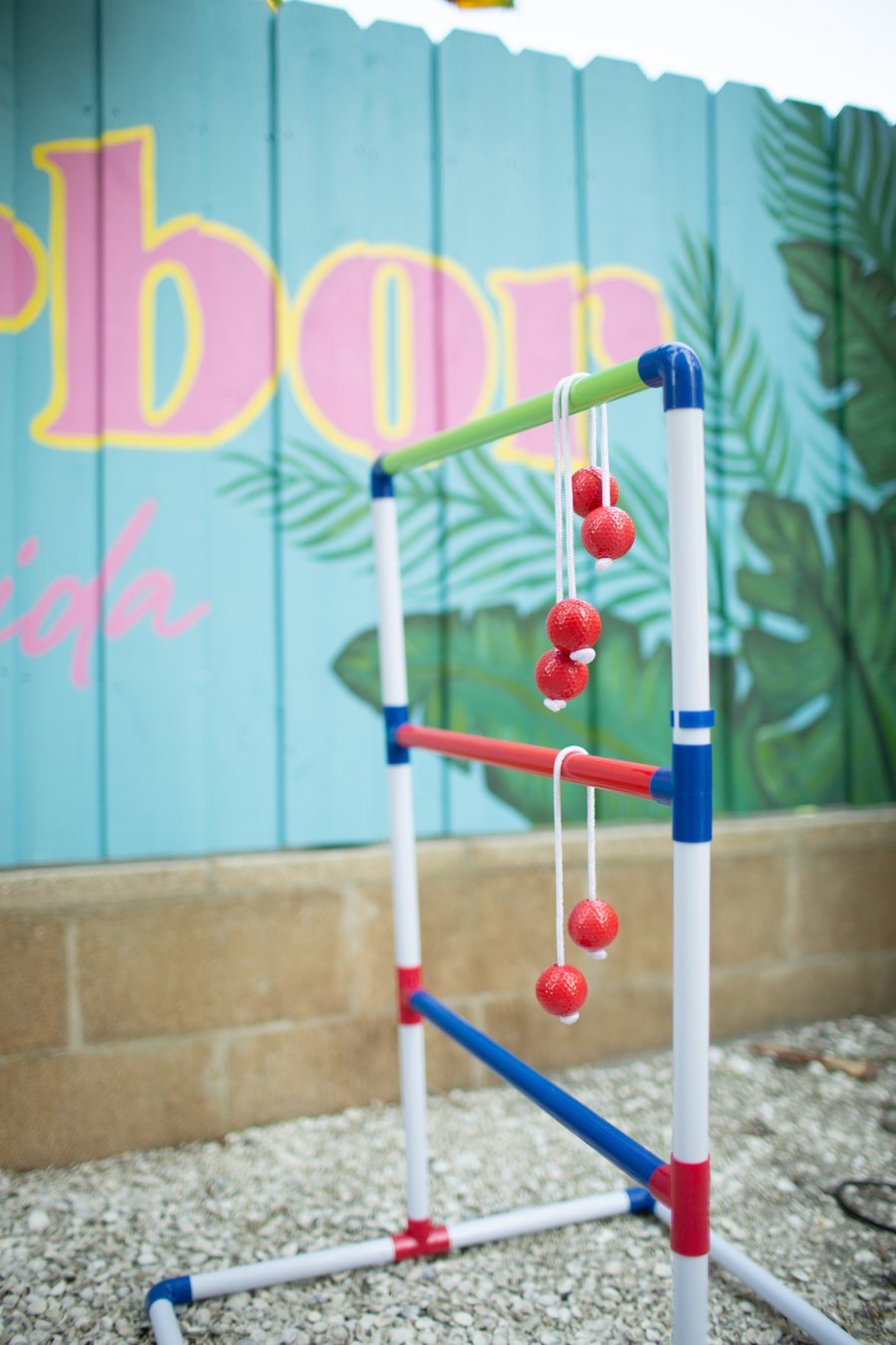 Ladder ball set in front of the Palm Harbor mural